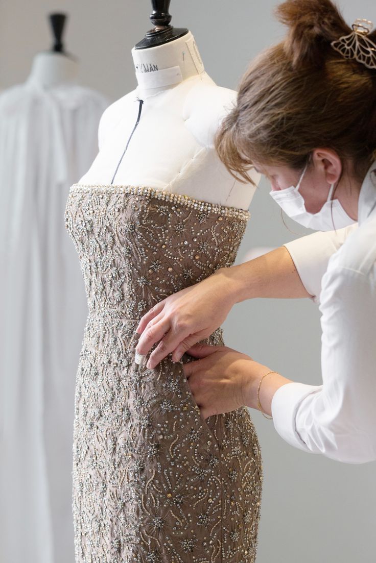 Dress being made.